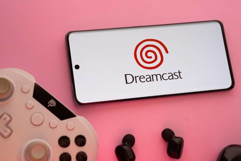 Dhaka, Bangladesh- 08 Apr 2025: A smartphone displaying the Dreamcast logo next to a gaming