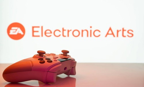 Dhaka, Bangladesh- 20 Mar 2025: A close-up of a white gamepad with the Electronic Arts seen on