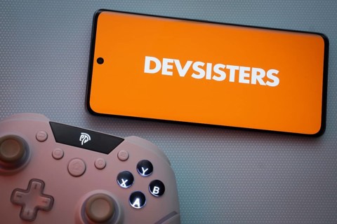 Dhaka, Bangladesh- 22 March 2025: Devsisters logo displayed on a smartphone surrounded by gaming