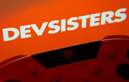 Dhaka, Bangladesh- 24 Mar 2025: A close-up of a gamepad with the Devsisters seen on screen in the