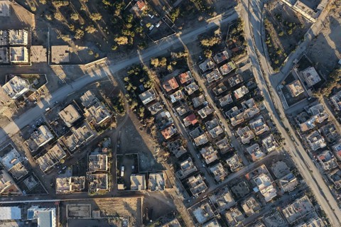 In Deir ez-Zor, Eastern Syria on January 21, 2026, an aerial drone shot captures the city landscape