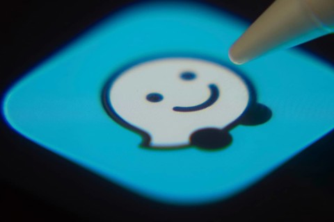 Dhaka, Bangladesh- 06 Dec 2025: Close-up of the Waze app on a screen with a stylus pointing at it
