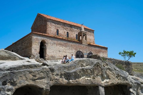 Ancient brick church on rocks, historical architecture in natural surroundings, 10th century