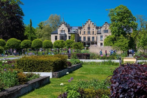 Blooming gardens at Ippenburg Castle, Bad Essen, Lower Saxony, Germany