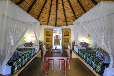 Round cabin, guest accommodation, Planet Baobab, lodge near the village of Gweta, interior view,