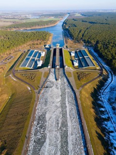 View of a lock with surrounding landscapes and frozen water surfaces, aerial view, Hohenwarthe