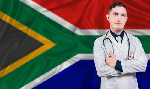 Portrait of medical professional on South Africa flag background. South African national health