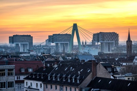 View over the city center of Cologne, residential buildings in Cologne-Deutz in front, pillar of