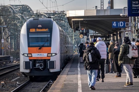 Long-distance train and regional train at Cologne-Messe/Deutz station, 2nd largest station in