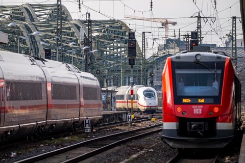 Rail track in front of Cologne Central Station, Hohenzollern Bridge across the Rhine, ICE