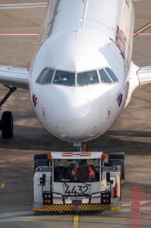 Eurowings Airbus is pushed from the gate onto the taxiway, ready to go, to Cologne/Bonn Airport,