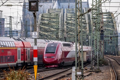 Rail track in front of Cologne Central Station, Hohenzollern Bridge across the Rhine, Eurostar