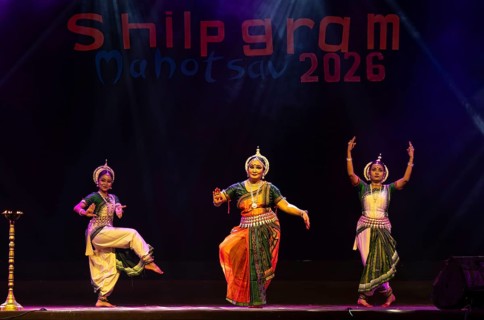 Artists perform Odissi classical dance during a cultural evening program at Shilpgram Mohotsav 2026