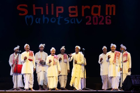 Artists perform 'Ojapali' folk song during a cultural evening program at Shilpgram Mohotsav 2026 in