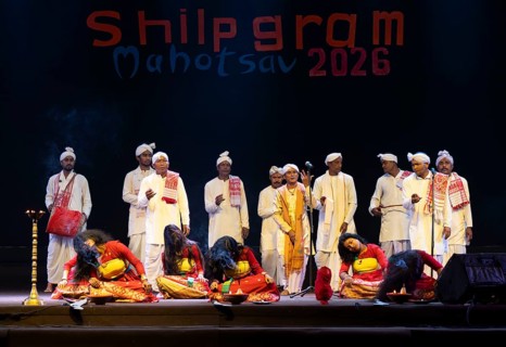 Artists perform 'Ojapali' folk song with Deodhani dance during a cultural evening program at