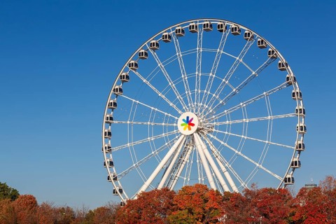 The Montreal Observation Ferris Wheel or La Grande Roue de Montreal amusement ride in autumn, Old