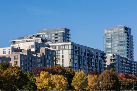 Group of luxurious multistorey high end residential condominium apartment buildings in autumn, Old