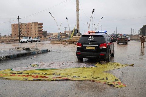 In Raqqa, Syria on January 18, 2026, a convoy of Syrian Government forces is seen advancing through