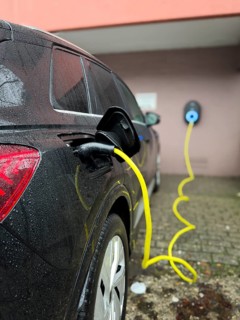 An e-car is charged at a wallbox, Wuppertal, Germany