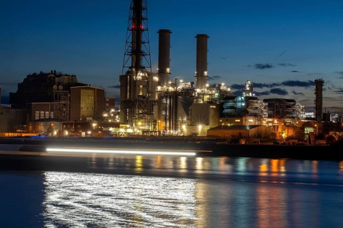 Evening shot of BASF in Ludwigshafen with the Rhine in the foreground