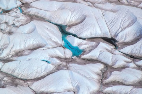 Aerial view of meltwater on the Greenland ice sheet, Arctic landscape, frozen wilderness, glaciers