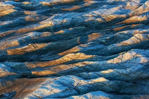 Aerial view of Ice sheet in Greenland, Arctic landscape, frozen wilderness, glaciers and