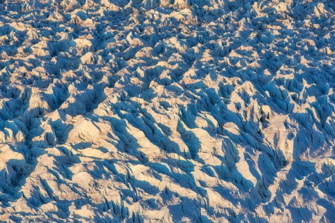 Aerial view of Ice sheet in Greenland, Arctic landscape, frozen wilderness, glaciers and