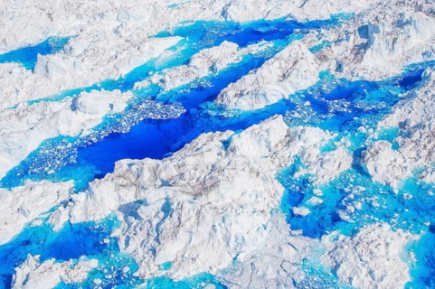 Aerial view of meltwater on the Greenland ice sheet, Arctic landscape, frozen wilderness, glaciers