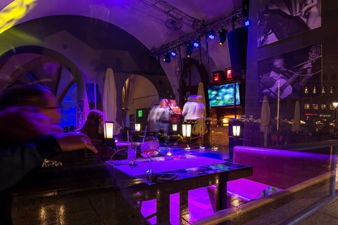 View of a karaoke bar at night, Krakow, Poland