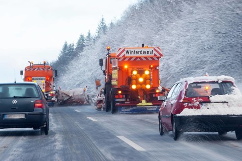 Winter maintenance, snowplow, spreader on snowy highway, Upper Bavaria, Germany