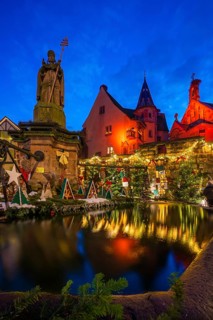 Houses illuminated and decorated for Christmas, Christmas market, blue hour, Eguisheim, Haut-Rhin