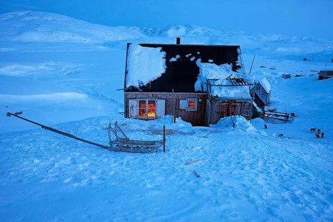 Tiniteqilaaq in a winter night, The village is one of five settlements around Ammassalik Island,