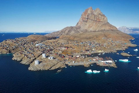 Aerial view of the village of Uummannaq, located on Uummannaq Island in the Uummannaq Fjord,