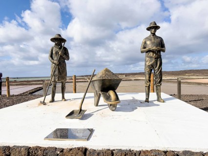 Bronze figures at the Salinas de Janubio, Lanzarote, Canary Islands, Spain