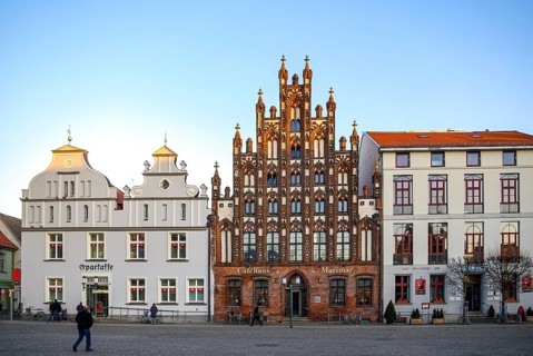 Historic brick Gothic buildings on the market square of the Hanseatic City of Greifswald,