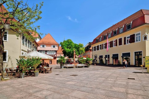 Ettlingen, Germany - August 13th 2025: Fountain at Ettlingen Schlosplatz town square on a sunny day