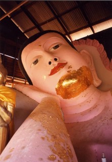 Reclining Buddha in Wat Srisoonthron Temple, Koh Siray The reclining Buddha symbolizes the last