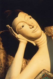 Reclining alabaster Buddha at Wat Sai Thai. The reclining Buddha symbolizes the last earthly hours