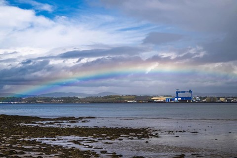 Rainbow over Forth Estuary, Forth Bridge, Queensferry Crossing, Scotland, UK