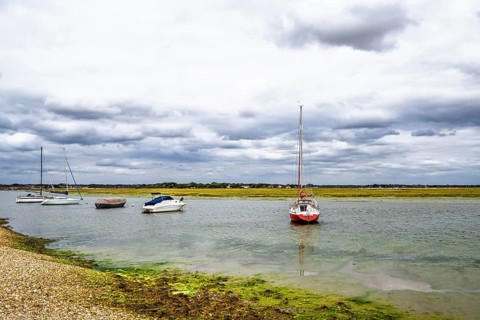 Boats and Marshes over Hurst Spit, Milford on Sea, Lymington, Hampshire, UK