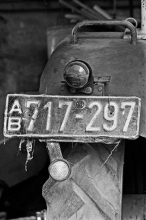 Old tractor license plate from the 1950s, on a former Franconian farm, black and white, Bavaria,