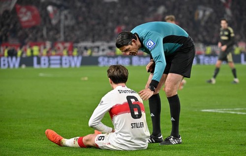 Referee Deniz Aytekin attends to Angelo Stiller VfB Stuttgart (06) injured Injury MHPArena, MHP