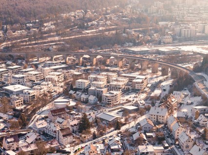 Snowy town with an impressive viaduct in a hilly landscape, Nagold, Calw district, Black Forest,