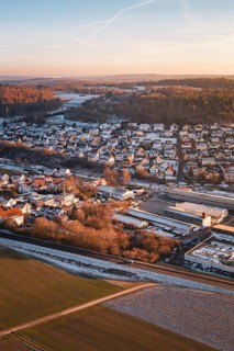 Wintery urban landscape with fields and roads at dawn, quiet atmosphere, Althengstett, Calw
