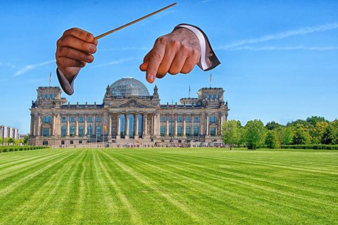 Conductor hands and Reichstag building. Who conducts whom here? Plenary area Reichstag building,