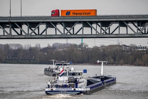 Cargo ships, Krefeld-Uerdinger bridge across the Rhine, near Krefeld-Uerdingen, North