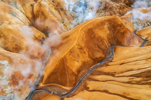 Aerial view of the misty geothermal landscapes of Hveradalir, located in the active Kerlingarfjöll