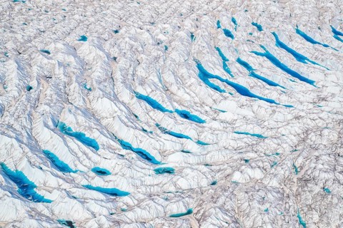Surface meltwater on the Greenland Ice Sheet, visible impact of climate change, Aerial view,