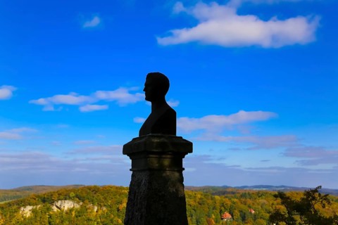 Wilhelm Hauff memorial, rocks above the Echaz Valley, monument from 1839, obelisk with bronze bust,