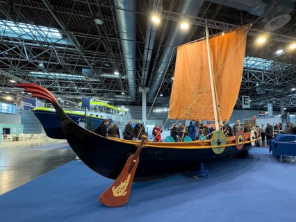 Press photo of replica Viking ship Viking boat sailing ship, large rudder blade in the middle of